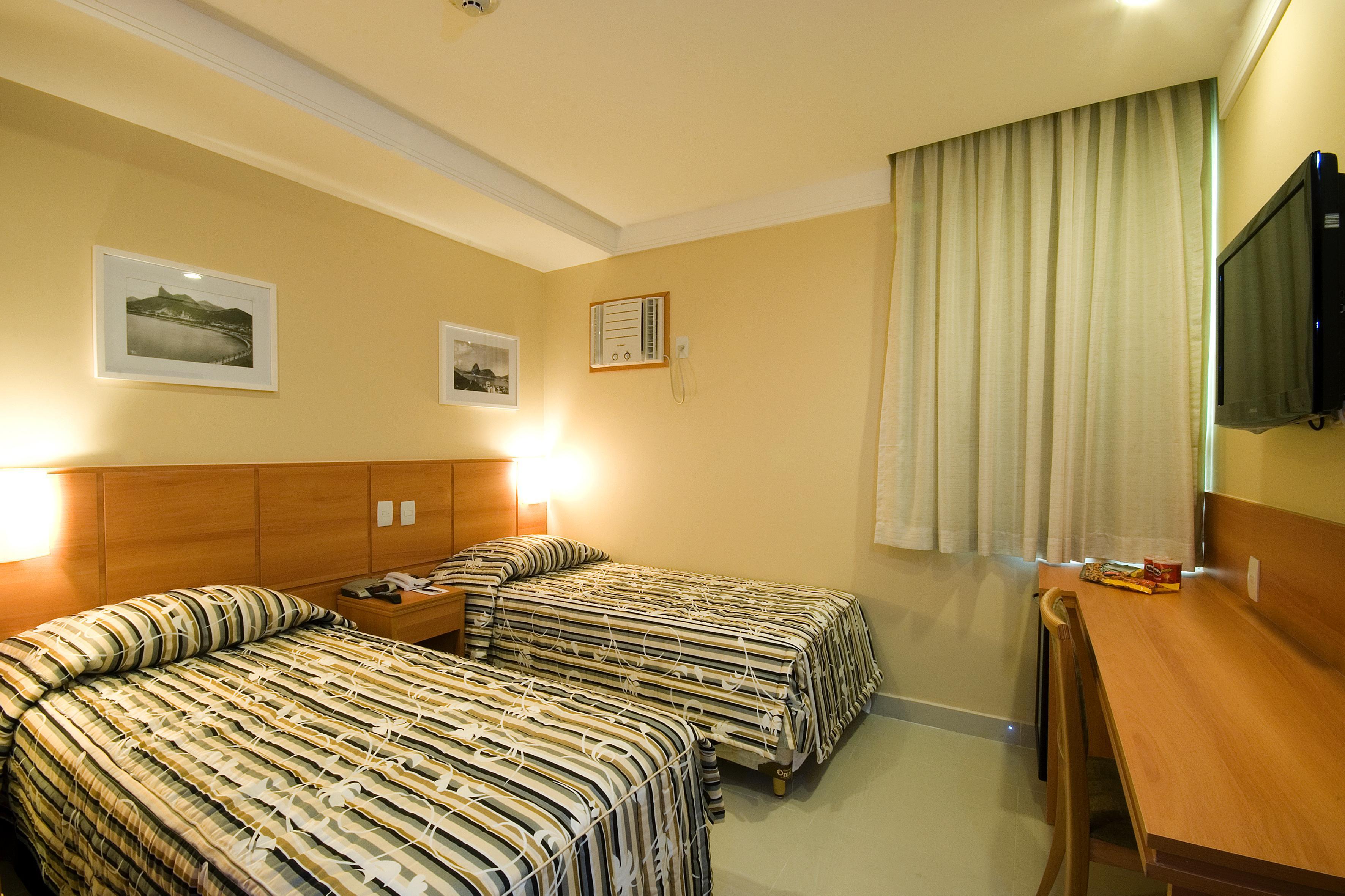 Hotel Atlantico Business Centro ริโอเดจาเนโร ภายนอก รูปภาพ A room at a hotel in Fortaleza, Brazil.